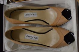 A pair of Jimmy Choo ladies beige patent leather high heel shoes, with original box, size 39.