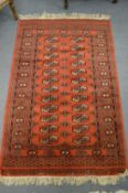 A modern Bokhara style rug, 143cm x 94cm.