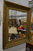Decorative gilt framed mirror.