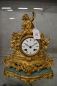 A French ormolu mantel clock and stand.