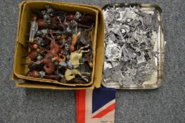 A collection of painted dye-cast soldiers on horseback and other items.