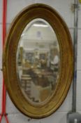 A small oval mirror.