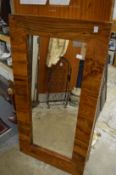 Large hardwood framed mirror.
