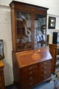 A good George III design mahogany and inlaid bureau bookcase.
