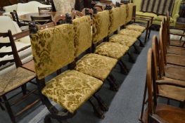 An unusual set of six Italian X framed dining chairs with upholstered backs and seats.