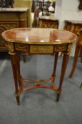 A good pair of French style kingwood ormolu and marquetry inlaid oval occasional tables.