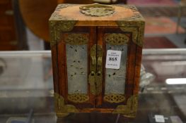 A Chinese miniature table cabinet with inset hard stone panels.