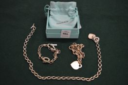 A Tiffany silver bracelet and two further bracelets.