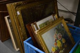 A still life of roses on a table, watercolour and various other paintings and prints.