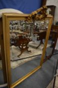 A large gilt framed pier mirror.