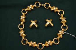 A Robert Lee Morris necklace and matching earrings.