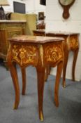 A pair of French style marquetry inlaid bombe single drawer side tables.