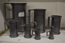 A graduated set of seven Continental pewter measures.