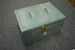 A leather jewellery box.
