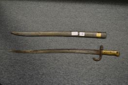 A bayonet and scabbard.