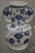 A Chinese blue and white twin handled vase.