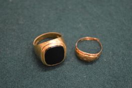 A 9ct gold signet ring and a small 18ct gold ring.