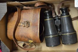 A pair of early binoculars with leather case.