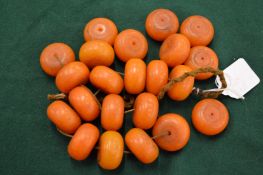 A chunky amber bead necklace.