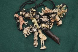 Decorative necklace mounted with various animals.