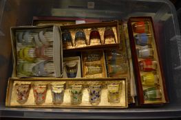 Box sets of mid century colourful glassware.