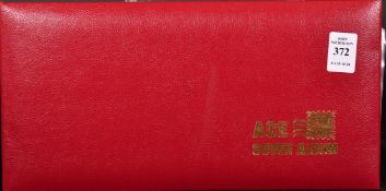 AN ALBUM OF 46 FIRST DAY COVERS.