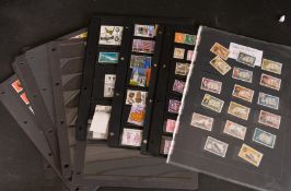 TWENTY-TWO SHEETS OF BRITISH AND BRITISH COMMONWEALTH ELIZABETH II STAMPS.