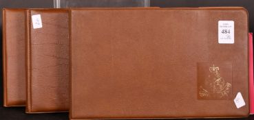 ISLE OF MAN: THREE ALBUMS OF UNUSED MINT STAMPS.