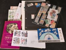 A MIXED LOT: THREE STANLEY GIBBONS CATALOGUES 1954, 1952, 1957; FIRST DAY COVERS 1965-1980.
