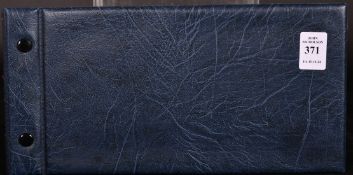 AN ALBUM OF 55 FIRST DAY COVERS.