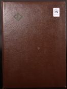 AN ALBUM OF BRITISH COMMONWEALTH STAMPS. 15 pages and loose stamps.