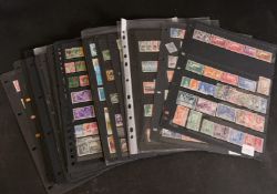 THIRTY SHEETS OF BRITISH AND BRITISH COMMONWEALTH STAMPS, Victoria to Elizabeth II.