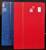 TWO ALBUMS OF VARIOUS STAMPS.