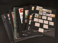 THIRTY-THREE SHEETS OF BRITISH AND BRITISH COMMONWEALTH STAMPS, Victoria to Elizabeth II, some