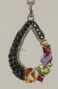 A SILVER PEAR SHAPED OPEN WORK PENDANT set with black and white CZs, citrine, peridot, amethyst