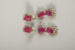 A GOOD SILVER SET GOLD, EMERALD, DIAMOND AND RUBY EARRINGS.