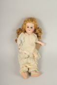 S. F. B. J. FRENCH BISQUE HEADED DOLL, open and shut eyes, articulated body, long hair, clothed.