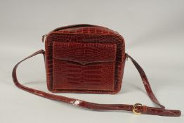 A LANA OF LONDON BROWN SNAKESKIN BAG. 26cms wide x 22cms deep.
