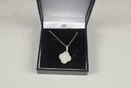 A SILVER AND MOTHER-OF-PEARL CLOVER PENDANT AND CHAIN.