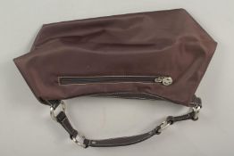 A POURCHET BROWN FABRIC BAG. 34cms long x 20cms deep.