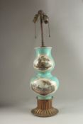 A GOOD CONTINENTAL PORCELAIN DOUBLE GOURD VASE painted with hunting scenes. 36cms high.