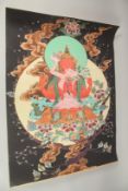A TIBETAN THANGKA on paper.