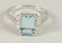A GOOD PLATINUM AQUAMARINE AND DIAMOND RING.