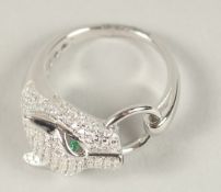 A SILVER PANTHER HEAD RING.
