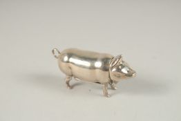 A SMALL SILVER PIG VESTA. 5cms.