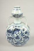 A CHINESE BLUE AND WHITE PORCELAIN MOON FLASK, with fish and algae. 27cms high.