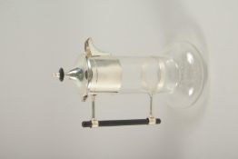 A CHRISTOPHER DRESSER DESIGN CLARET JUG.