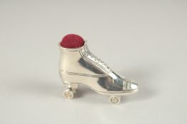 A SILVER PIN CUSHION 