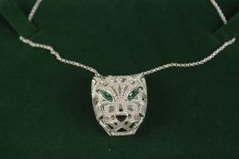 A SILVER PANTHER HEAD NECKLACE.