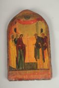 A RUSSIAN ICON WITH ARCHED TOP, five saints. 30cms x 19cms.